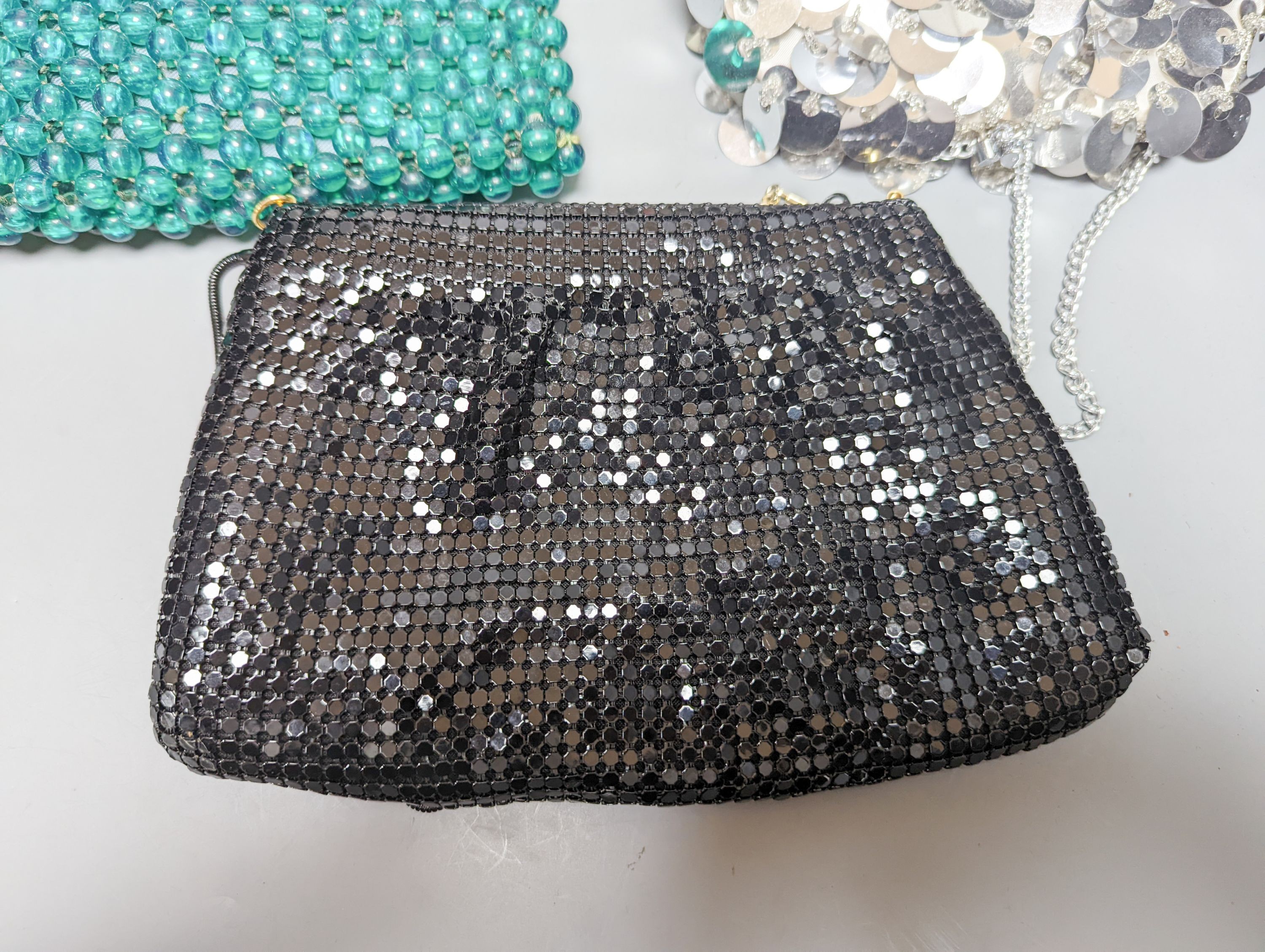 Two American 1950's-60's novelty handbags and three beaded evening bags
